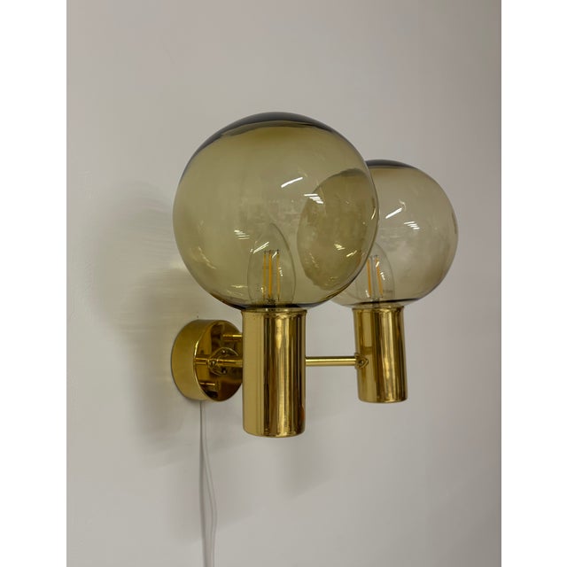 Brass Lamp with two Round Smoke colored Glass Shades. This piece has an attribution mark, I am sure that it is completely...