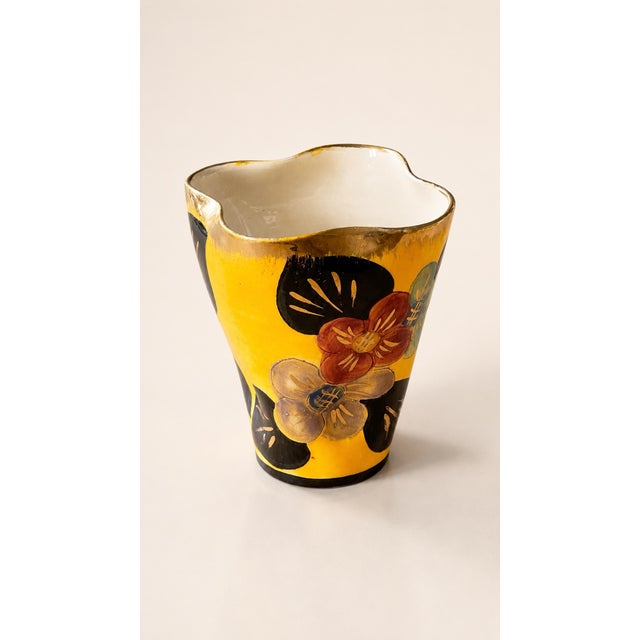 Vintage Vallauris vase in glazed ceramic, with a colorful floral design. A beautiful piece from the 1950s-60s with an...