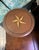 A beautifully crafted Colonial‑style mahogany stand featuring a round lift‑off top with an incised black circle and a...