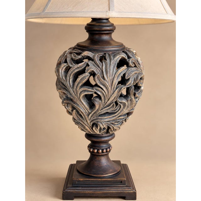 This extra-tall vintage table lamp combines elaborate Old World craftsmanship with a lighter, more relaxed transitional...