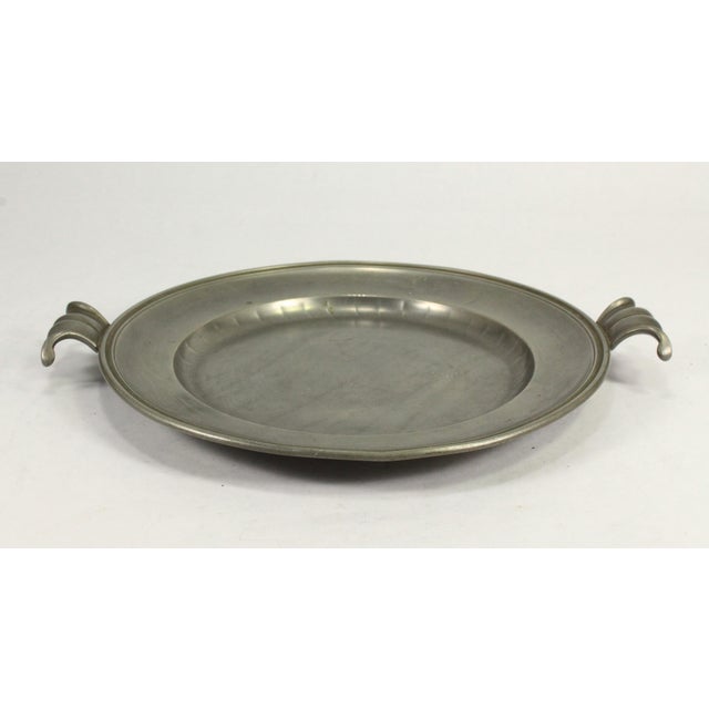 An impressive pewter serving dish Round plate with two attached scalloped handles Jugendstil aesthetics from the Art...