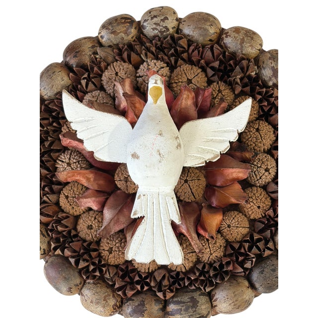 Enhance your decor with this beautifully crafted wood wall hanging sculpture. A white wooden dove bird —crowns atop of...
