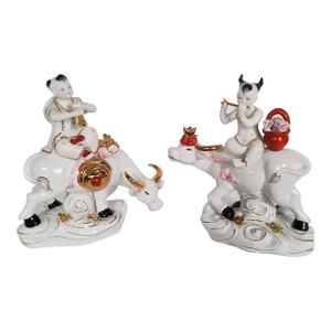Pair of Vintage Chinese Porcelain Children Sitting on Water Buffalos