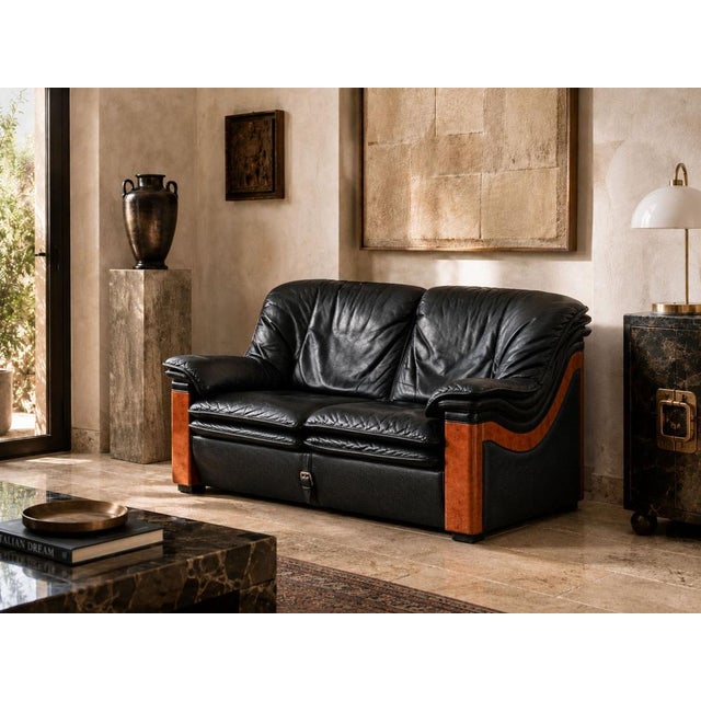 A rare and highly distinctive two-seat sofa designed by Paolo Gucci for Formitalia, Italy, circa 1991. The design...
