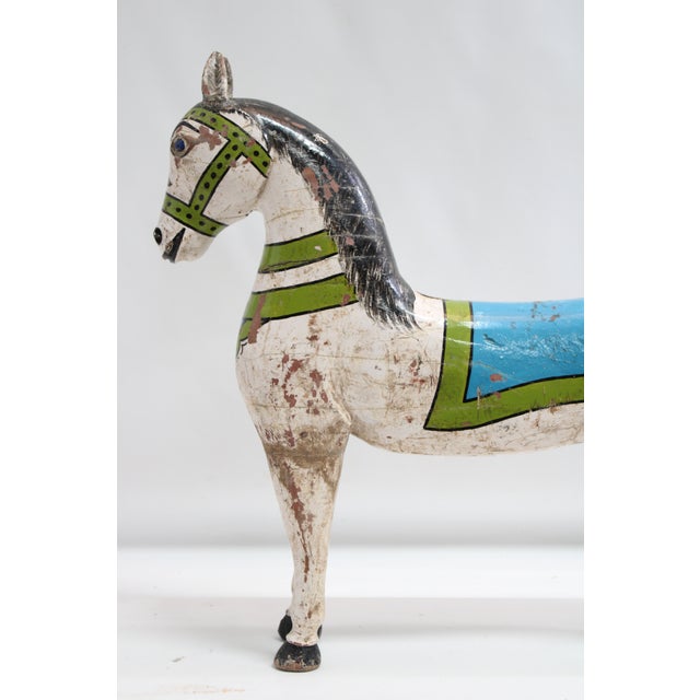 Horses make everything more beautiful! Let our carved child-sized carousel horse be a colorful accent in your home. Sure...