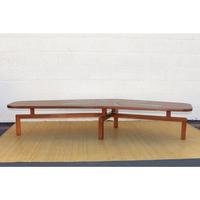 Spectacular Mid-Century Modern coffee table with mosaic top. This amazing relic is original from the 1960’s. It has an...