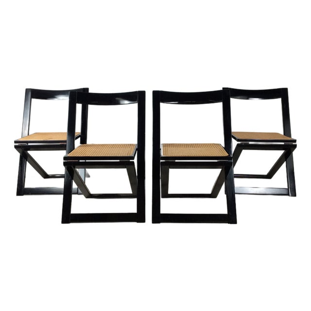 Set of 4 Folding Chairs With Black Lacquer Finish and Caned Seats For Sale