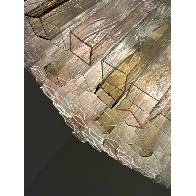 Scenographic and luxury flush mount , all made in Italy, made in Murano glass. Transparent, pink and fumè color give warm...