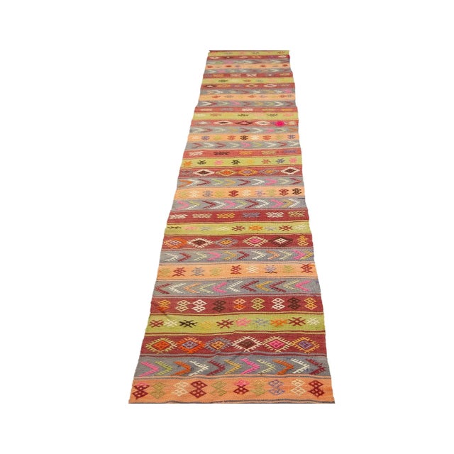 Vintage handwoven decorative kilim runner from Denizli region of Turkey. Approximately 45-55 years old. In very good...