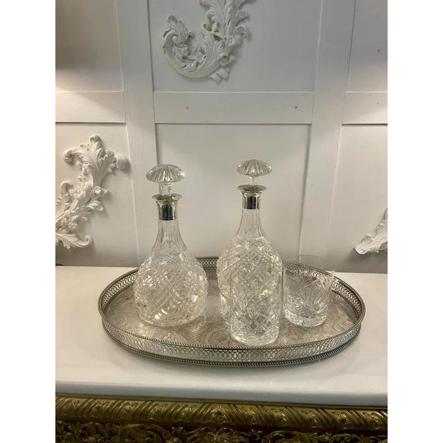 Antique Edwardian quality silver plated engraved tea tray having a quality silver plated engraved oval shaped tea tray...