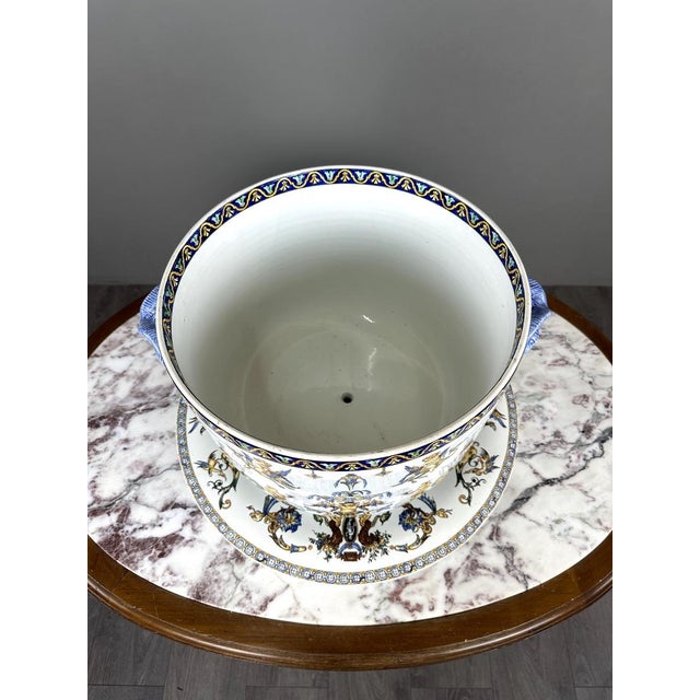 Elegant Gien earthenware set from the renowned Renaissance Collection, comprising a cachepot and matching display stand....