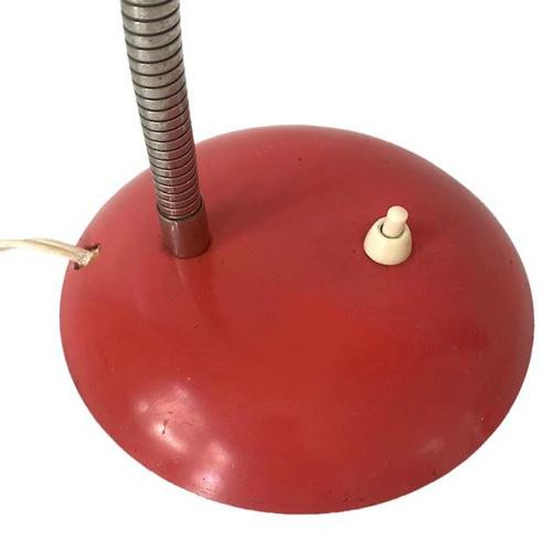 Nice vintage retro red pink desk lamp from the 1950s in the style of Bauhaus and Hala Zeist. This lamp has an even...