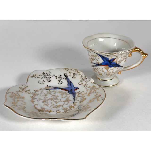 Japanese Blue Swallow Demitasse Cup and Saucer for your consideration. The cup measures approx. 2 inches tall and approx....