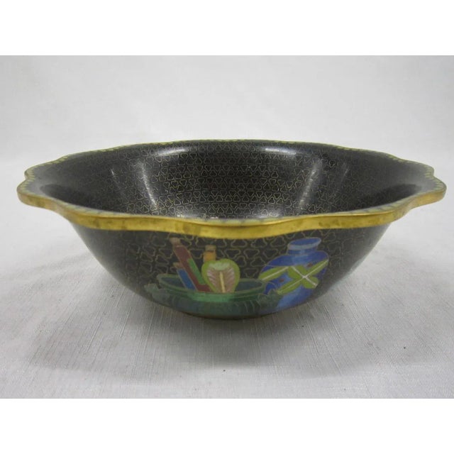 Beautiful 1920's Chinese Cloisonne bowl. Embellished with iconic designs of flower and fruit offerings, it is a very deep...