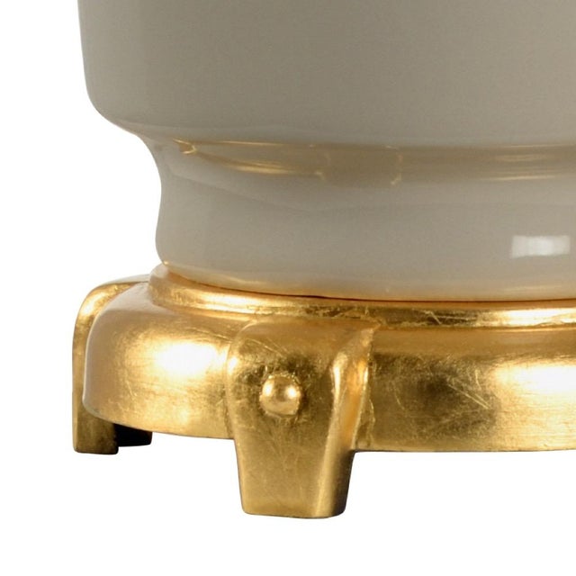 Complement your transitional or contemporary decor with this versatile 32" accent lamp. A warm antique gold leaf finished...