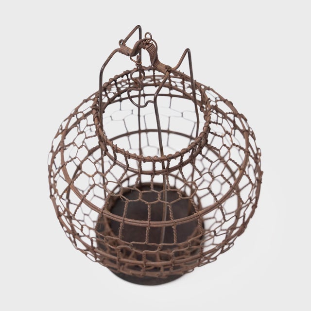 This vintage Chinese lantern once hung from a small boat, illuminating the waters for nighttime fishing. Hand-woven from...