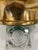This wine coaster is gold plated The outer edge features garlands of grapes and grape leaves The condition is excellent