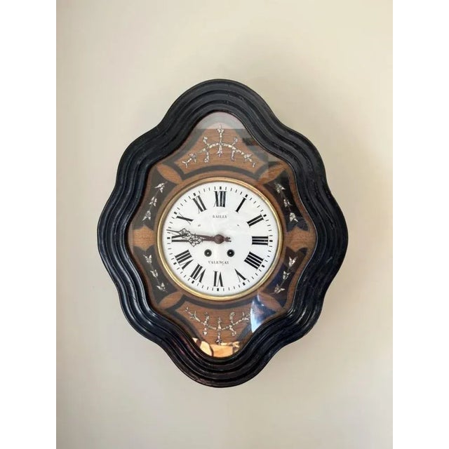 Fantastic quality antique Victorian French wall clock in an attractive shaped case, fantastic inlaid detail, a circular...