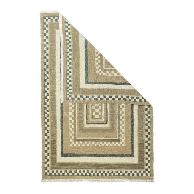 A technique rather than a specific type, in which warps are wrapped by colored wefts to create a pattern. Caucasian,...