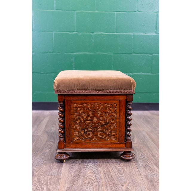 An incredibly constructed, original early Victorian Rosewood and mahogany piano stool or ottoman with internal storage....