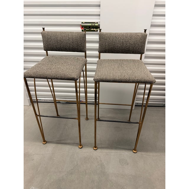 I curated these vintage brass and tweed Mid-Century counter stools for my first apartment. I love them because they are...