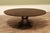 Mid-Century Modern 64–84-Inch Expandable Cherry Jupe Dining Table With Brass Stretcher and Brass-Capped Saber Legs For Sale - Image 3 of 13