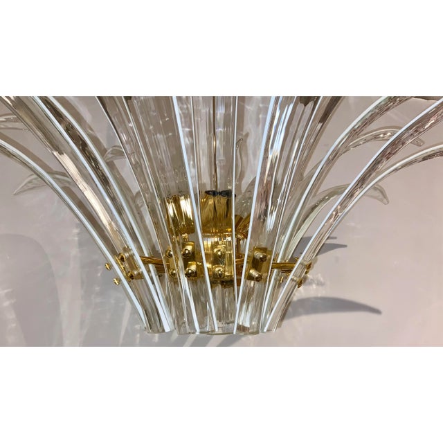 Original Retail $15,600 timeless Modern Italian Murano Glass Chandelier, textured glass, gold plated frame, showroom floor...