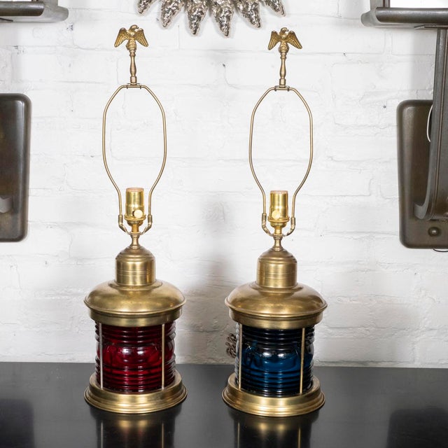 Pair of red and blue repurposed railroad light table lamps. These lamps feature an internal light operated by a separate...