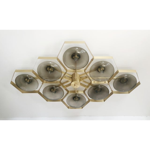 Italian midcentury flush mount with eight smoky Murano glass shades mounted on solid brass frame in satin brass finish /...