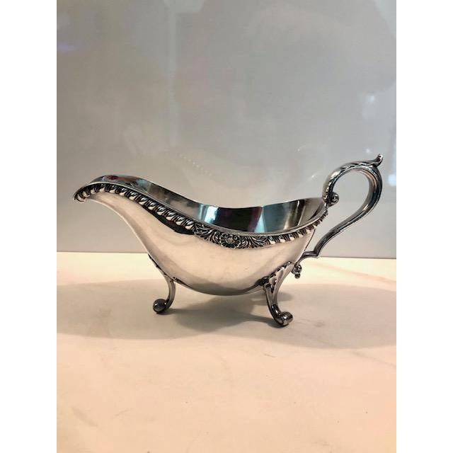 This lovely 1940s Silverplate Gravy or Sauce Boat will be a sophisticated addition to your formal tablescape. Beautifully...