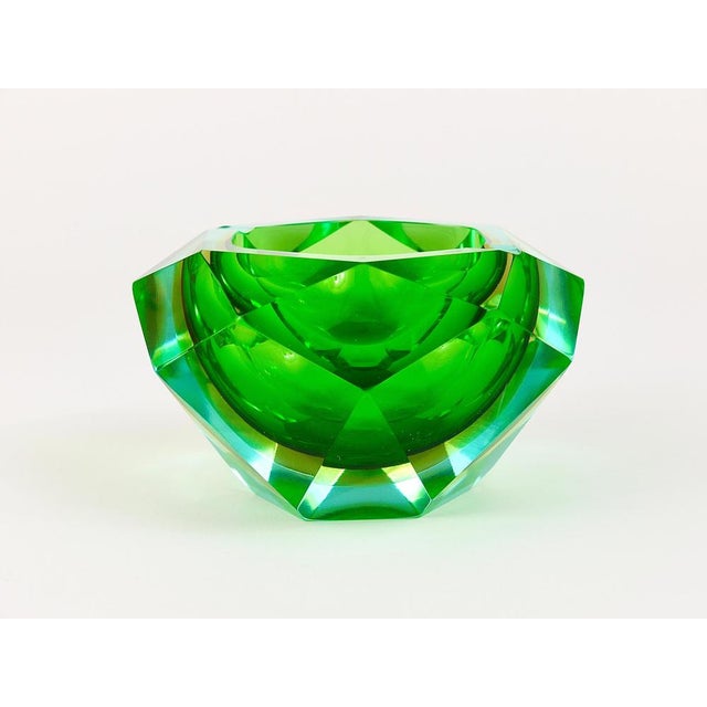 A beautiful multi-faceted and polished Murano glass ashtray in a wonderful diamond shape from the 1960s. Designed by...
