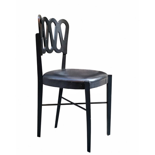 Iconic chair model 969, designed by renowned Italian architect and designer Gio Ponti and produced by the historic Montina...