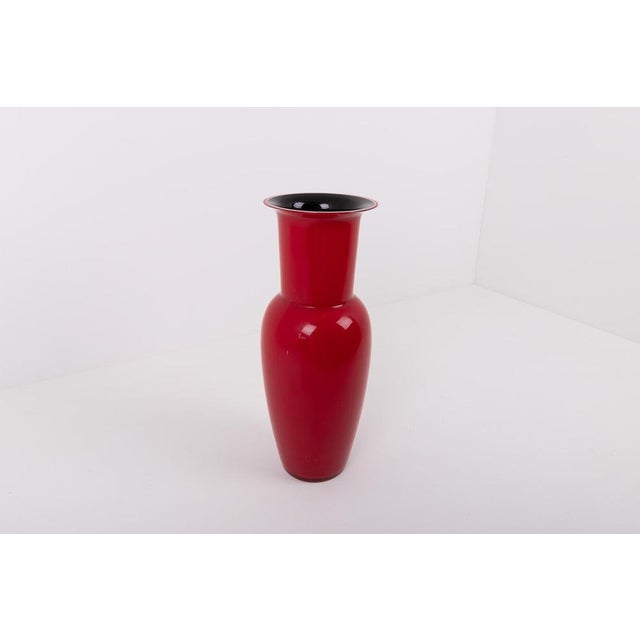 Spectacular handcrafted Murano glass vase from Venini, produced in Italy 1980’s. Enhance your home decor with the timeless...