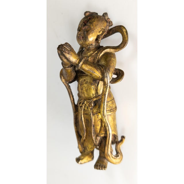We are selling this Chinese late Ming or Early Qing figure of a Boy. This figure still has attractive fire gilt surface on...