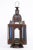 A Mid Century Ottoman Lantern with colored glass insets.