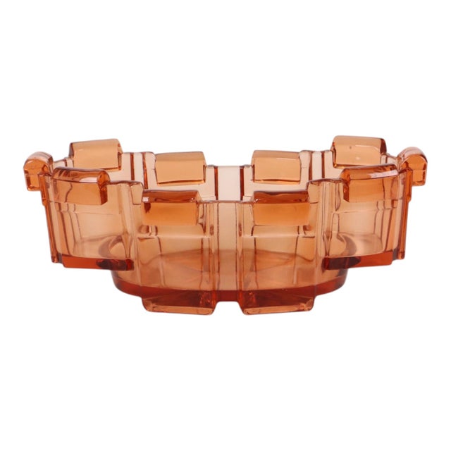 A rare Cubist Art Deco bowl or planter made of pink pressed glass, produced in the first half of the 20th century; the...