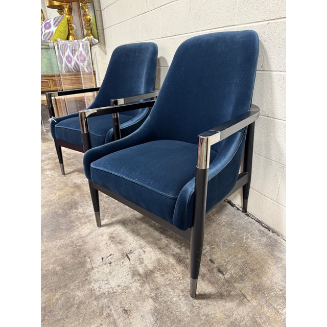 Lightly used navy velvet with black lacquer wood frame and chrome accents. Extremely heavy and solid. No maker name on...