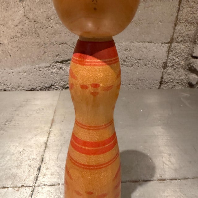 For your consideration, a traditional Japanese Kokeshi doll with label and inscriptions. Kokeshi dolls are simple,...