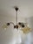 Vintage three-light chandelier manufactured by kaj d.o.o. In dol pri hrastniku, slovenia. The piece features an elegant...
