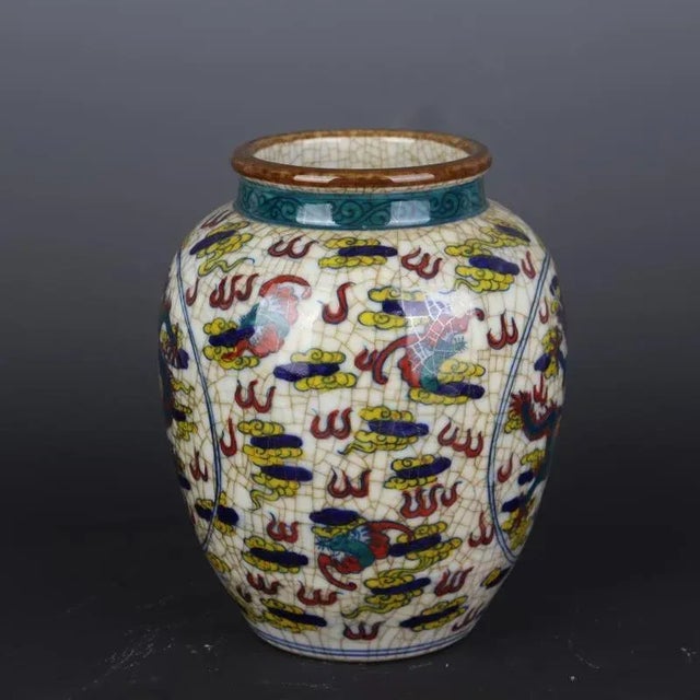 H-20.2cm,W-16cm The product is a vintage Kangxi marked Famille Verte porcelain jar featuring a hand-painted cloud dragon...