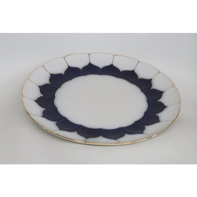 This gorgeous Plate made out of porcelain. We believe it was made by Meissen, it is stamp. It has an elegant color of...