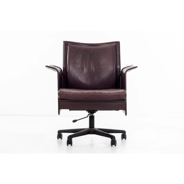 Tito Agnoli for Matteo Grassi "Korium" desk chair. Original leather with nice patina. Tilt, swivel adjustable hydraulic...