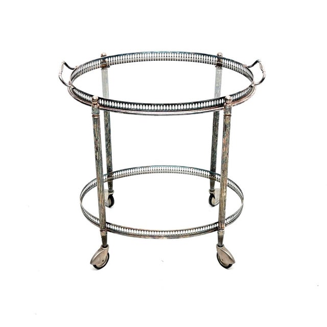 A beautiful vintage French silver plated drinks trolley. This was recently imported from France, it dates from the 1960’s....