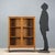 A 1950s-style display cabinet, crafted in Italy with walnut veneer. This elegant piece stands out for its simple yet...