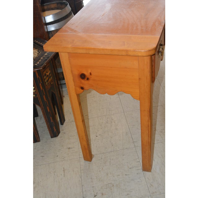 Great farmhouse/country console by Thomasville. I believe it is pine. 3 dovetailed drawers, brass hardware, & a pull out...