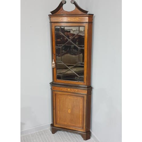 This is a very nice early 20th Century Edwardian antique mahogany inlaid floor standing corner cabinet, glazed top and...