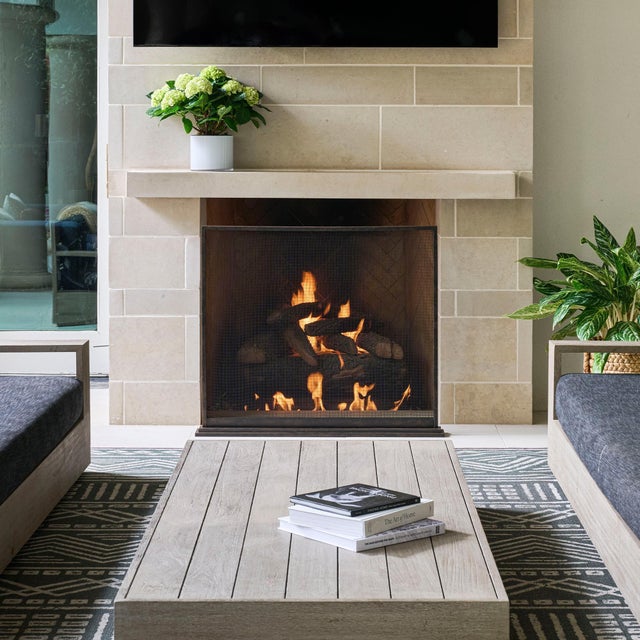 The August fireplace screen redefines modern elegance with its simplicity. Hand-forged of iron and featuring a step-up...