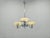 A refined art deco chandelier produced by napako in 1930s czechoslovakia, showcasing the elegance and precision of early...