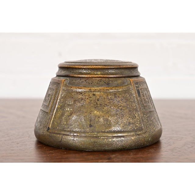 A gorgeous antique Arts & Crafts or Art Deco period bronze inkwell featuring Greek key designs By Tiffany Studios (signed...