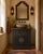 Antique Chinese Painted Elm Hall Cabinet, in its original faded black lacquer finish, 2 drawers over 2 doors with round...